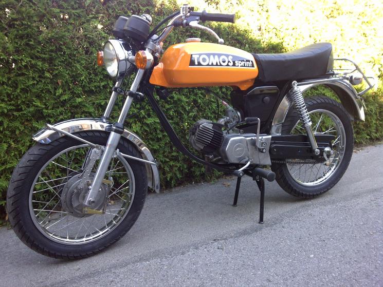 TOMOS